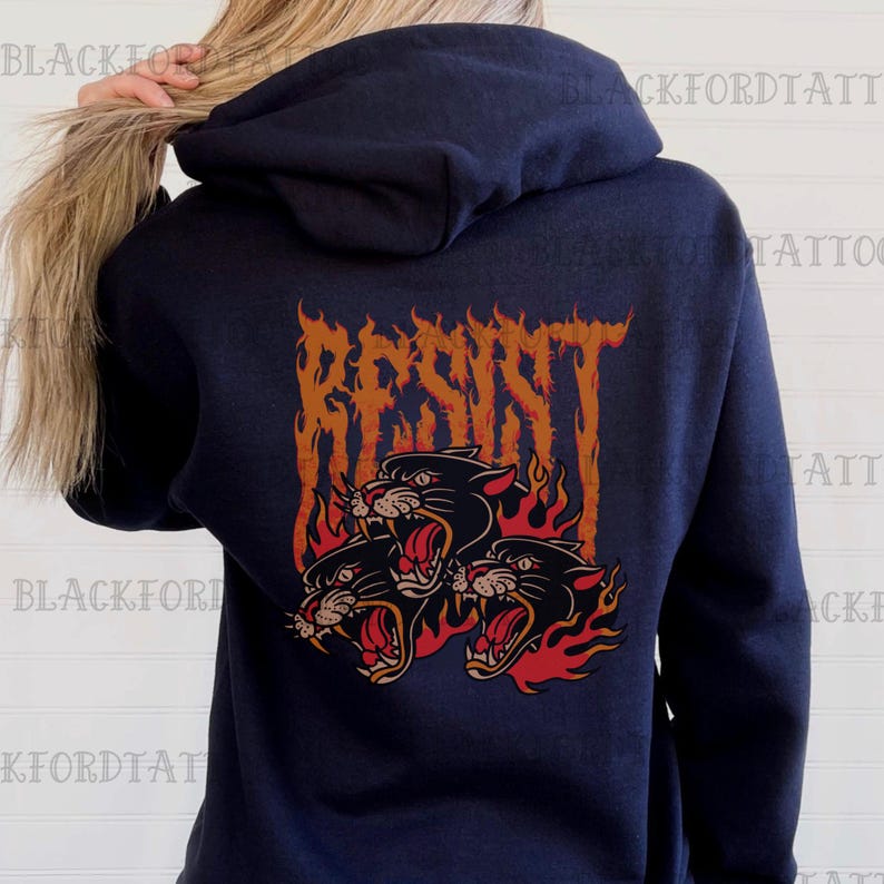 May include: A navy blue hoodie with a graphic of three black panther heads in flames with the word "RESIST" in orange above them.