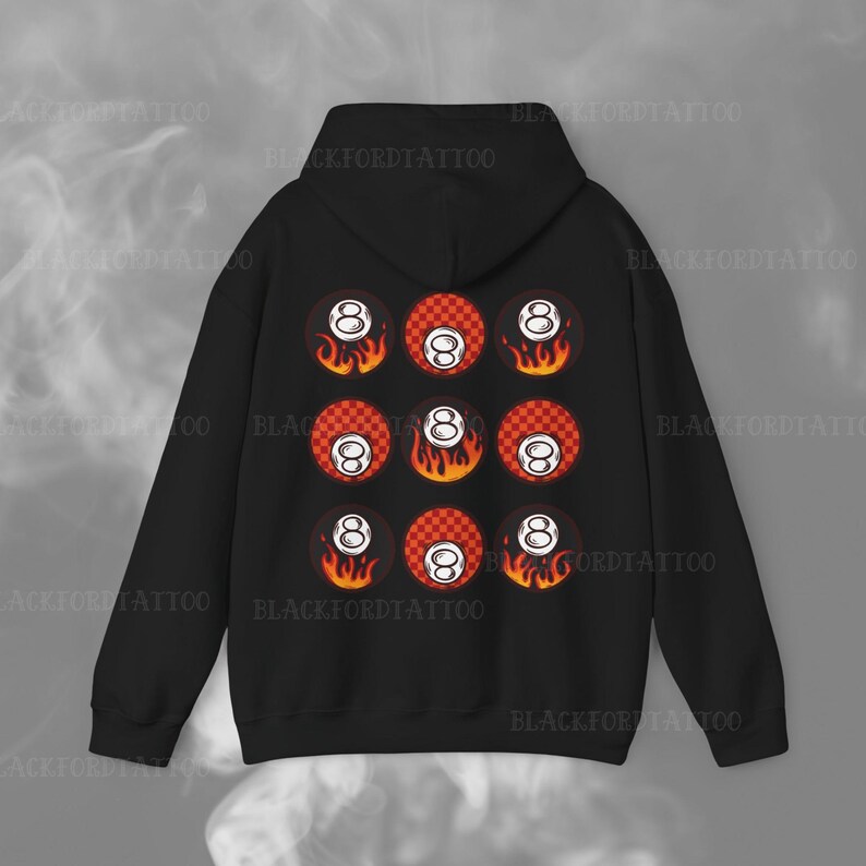 May include: Black hooded sweatshirt with a pattern of eight ball pool balls with flames on a red and white checkered background.