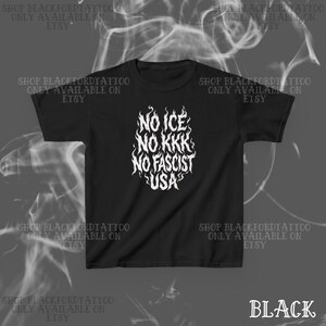 May include: Black t-shirt with white text in a flame design. The text reads "NO ICE, NO KKK, NO FASCIST, USA." The shirt also has the text "SHOP BLACKFORDTATTOO ONLY AVAILABLE ON ETSY" around the shirt.