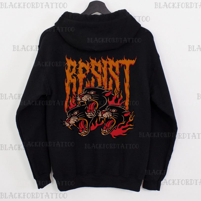 May include: Black hooded sweatshirt with a graphic print of three black panther heads in flames with the word "RESIST" in a stylized font.