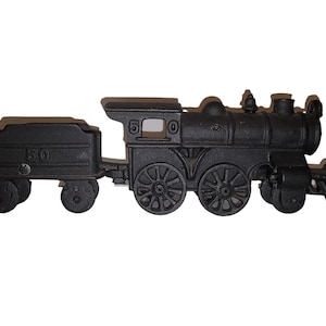 Chugging Through Time: Vintage Black Iron No. 50 Locomotive and Coal Car