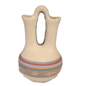 Whispers of the Southwest: A Timeless Navajo Etched Vase (Circa 1980s)