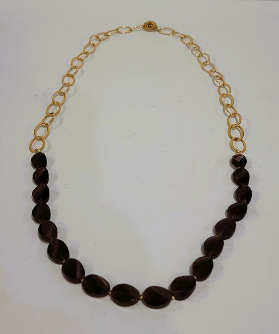 Gold Toned Necklace with Dark Purple Resin Beads |