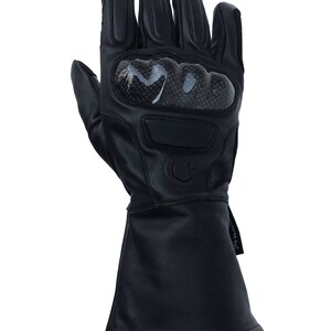 May include: Black leather motorcycle gloves with carbon fiber knuckle protection and a long cuff.