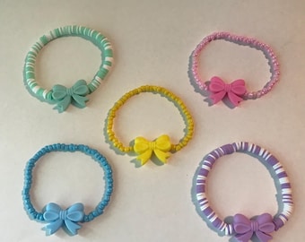 かわいいピンクのリボンブレスレット | アクリルビーズブレスレット