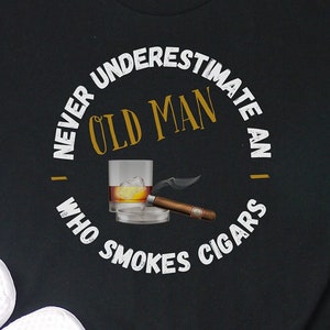 Never Underestimate An Old Man Cigars Shirt, Cigar Lover Tee, Cigar Gifts For Men, igar T Shirt, Bourbon T-Shirt, Cigars Accessories