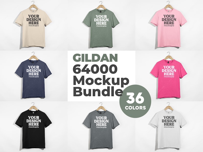 May include: A mockup bundle of 36 Gildan 64000 t-shirts in various colors. The t-shirts are displayed on hangers against a white background. The text "YOUR DESIGN HERE" is printed on each t-shirt.