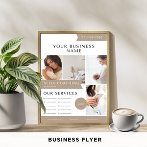 May include: A business flyer with a brown wooden frame, featuring a collage of images of mothers and babies. The flyer advertises sleep coaching services and includes the business name, phone number, and website address. The text "Sleep Coaching" and "Our Services" is in a brown rectangle with rounded corners.