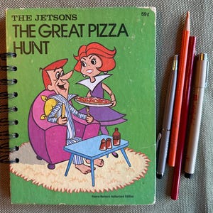 Repurposed famous Hanna Barbera space family, the Jetsons in &#39;The Great Pizza Hunt&#39; book. Perfect for drawing, doodling and journaling.