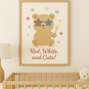 May include: A framed print featuring a cartoon bear wearing star-shaped sunglasses in red and blue. The bear holds a sparkler and is surrounded by stars. The text "Red, White, and Cute!" is below the bear.