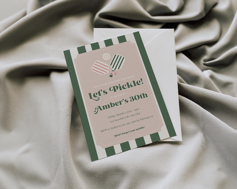 May include: A green and white striped invitation with a pink and green pickleball paddle graphic. The text reads "Let's Pickle! Amber's 30th" and includes details for a party on Friday, March 3rd, 2023 at 7pm. RSVP to Amber at 123-456-7890 by February 28th. The text also says "Don't forget your paddle!"
