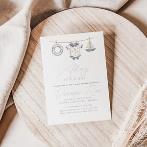 May include: A baby shower invitation with a nautical theme. The invitation features watercolor illustrations of a life preserver, onesie, and sailboat. The text reads "Ahoy, It's a Boy" and includes event details.