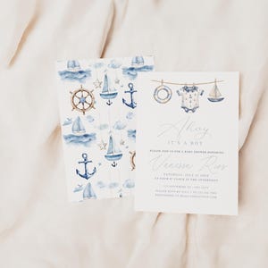 May include: Nautical-themed baby shower invitations with watercolor illustrations of sailboats, anchors, and a ship's wheel. The invitation reads "Ahoy, It's a Boy" and includes event details. The design features a matching patterned card.