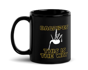 May include: Black coffee mug with a white silhouette of bagpipes and the text "BAGPIPES THIS IS THE WAY" in yellow.