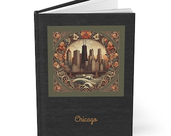 Puede incluir: Un diario negro con una cubierta decorativa que presenta una ilustración del horizonte de Chicago dentro de un borde floral. La palabra "Chicago" está impresa en escritura dorada en la parte inferior del diario.