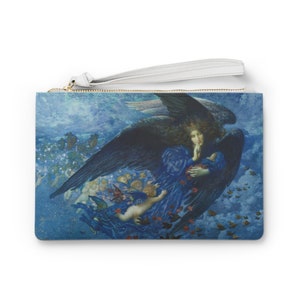 May include: A blue and black clutch bag with a zipper closure. The front of the bag features a painting of an angel with large black wings, holding a baby in her arms. The angel is surrounded by smaller angels and stars.