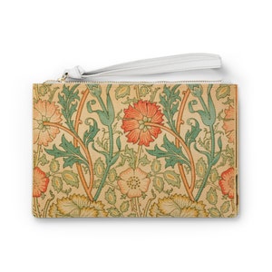 May include: A beige clutch purse with a white zipper and a white wrist strap. The purse features a floral pattern with red, orange, and green flowers.