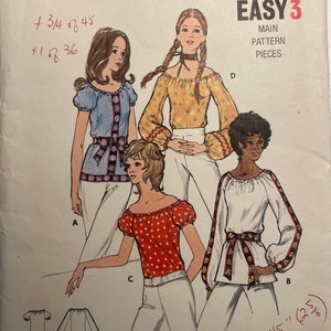 May include: A vintage sewing pattern for a blouse with a ruffled neckline and long sleeves. The pattern is from Butterick and is labelled Easy 3. The pattern number is 6206 and the price is 85 pence. The pattern includes instructions for sizes small, medium, and large.