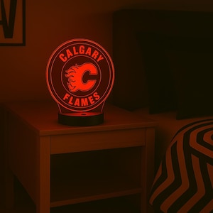 Calgary Flames LED Lamp – Hockey Night Light for Fans – NHL Decor – Flames Gift Idea – Cracked White or Black Base – USB or Battery