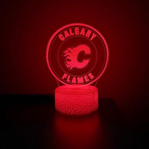 Calgary Flames LED Lamp – Hockey Night Light for Fans – NHL Decor – Flames Gift Idea – Cracked White or Black Base – USB or Battery
