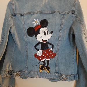 Minnie Mouse handpainted on the back of a jeans jacket.