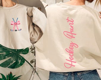 Custom Coquette Hockey Aunt Sweatshirt, Pink Bow Game Day Crewneck, Personalized Aunty Name Ice Hockey Gift, Sport Auntie Sweater, Tia Gift