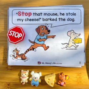 May include: A children's book illustration with a dog chasing a mouse that stole cheese. A red stop sign magnet and miniature figurines of a cat, mouse, and cheese are also present. The text reads: "Stop that mouse, he stole my cheese!" barked the dog.