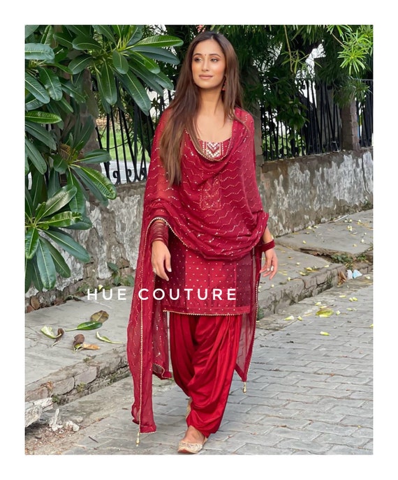 Buy BEAUTIFUL NET FABRIC EMBROIDERED SEQUENCE WORK RED SALWAR SUIT at  Amazon.in