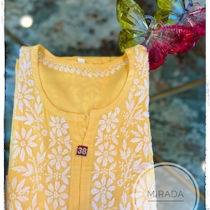 Elegant Lucknow Chikankari Modal Premium Cotton adorned with intricate embroidery.