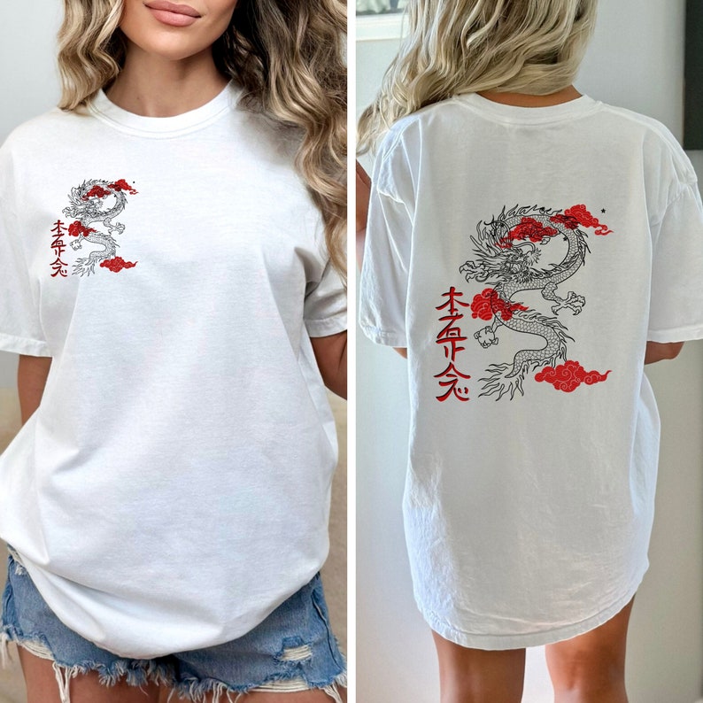 May include: White t-shirt with a black and red dragon graphic and the text "本命 天" on the back. The front of the shirt has the same dragon graphic in a smaller size.