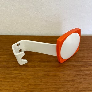 70s hooks coat hooks made of plastic and metal orange Mid Century Vintage