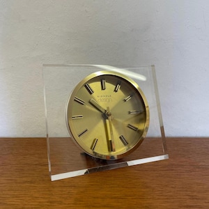 Kienzle design clock / table clock made of acrylic and metal in gold 70s Mid Century Vintage