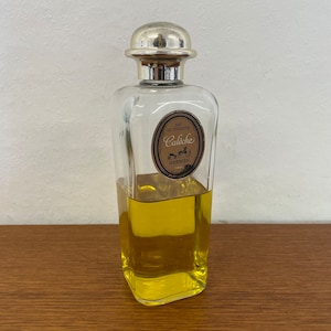 Bottiglia vintage di eau de toilette del profumo Hermes Caleche