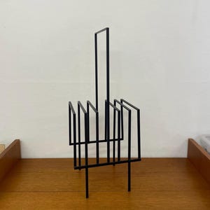 Magazine rack / newspaper rack made of metal in black 60s Mid Century Vintage