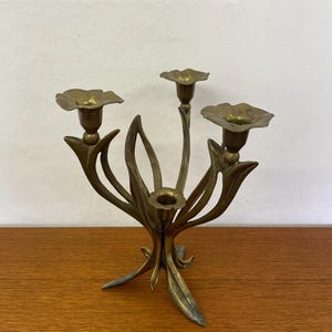 Brutalist four-flame flower candlestick / candle holder made of brass 40s-70s Mid Century Vintage