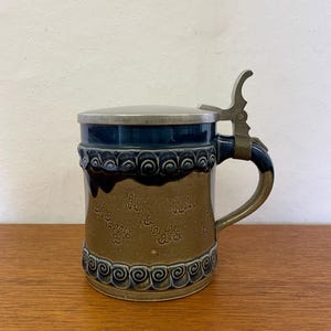 Rosenthal jug / beer mug by Björn Wiinblad made of ceramic in brown and blue 60s Mid Century Vintage