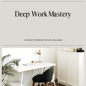 May include: A white desk with a laptop, a gold lamp, and a black chair. The desk is in a room with white walls and a white cabinet with two doors. The text "Deep Work Mastery" and "A 30 Day Intensive Focus Challenge" is visible on the image.