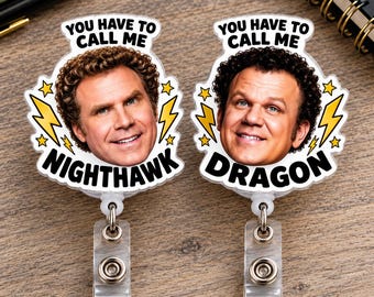 May include: Two circular badge reels featuring photographic portraits of men with curly hair. The left badge reads YOU HAVE TO CALL ME NIGHTHAWK with yellow lightning bolts. The right badge reads YOU HAVE TO CALL ME DRAGON with yellow lightning bolts.
