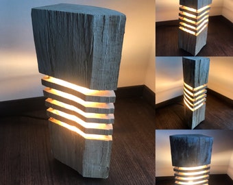 Une lampe en bois fabriquée à la main unique illumine votre monde avec une beauté naturelle