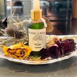 Opium body oil top