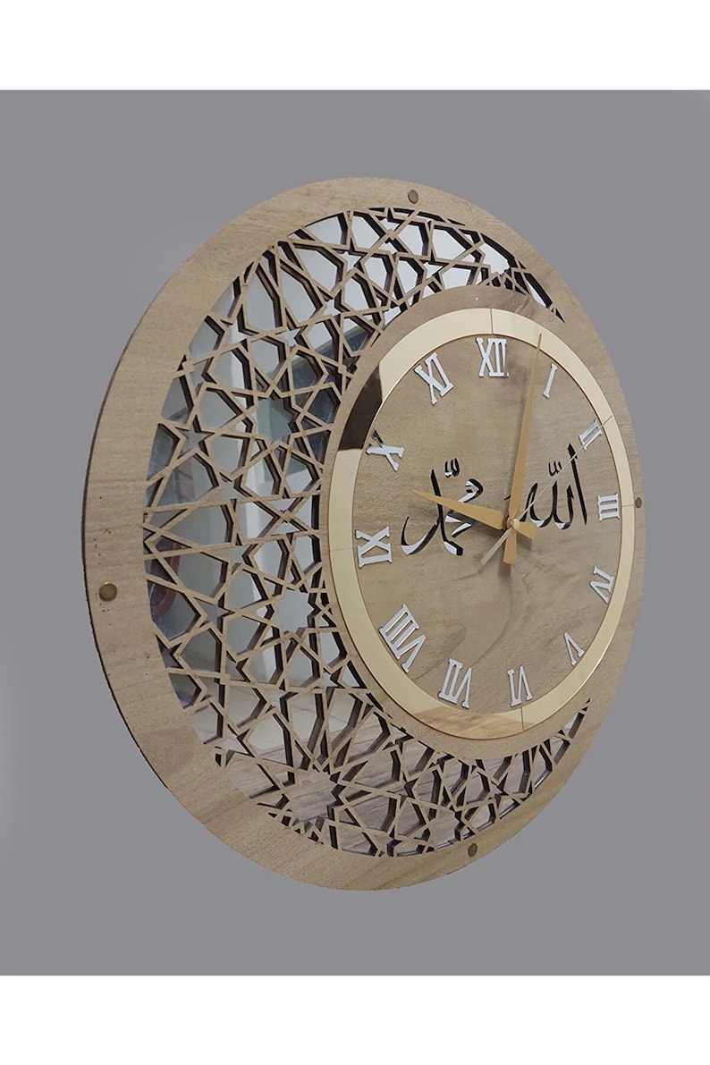 May include: A round wooden clock with a gold rim and Arabic numerals. The clock face has a geometric design and the words "الله" in Arabic script.