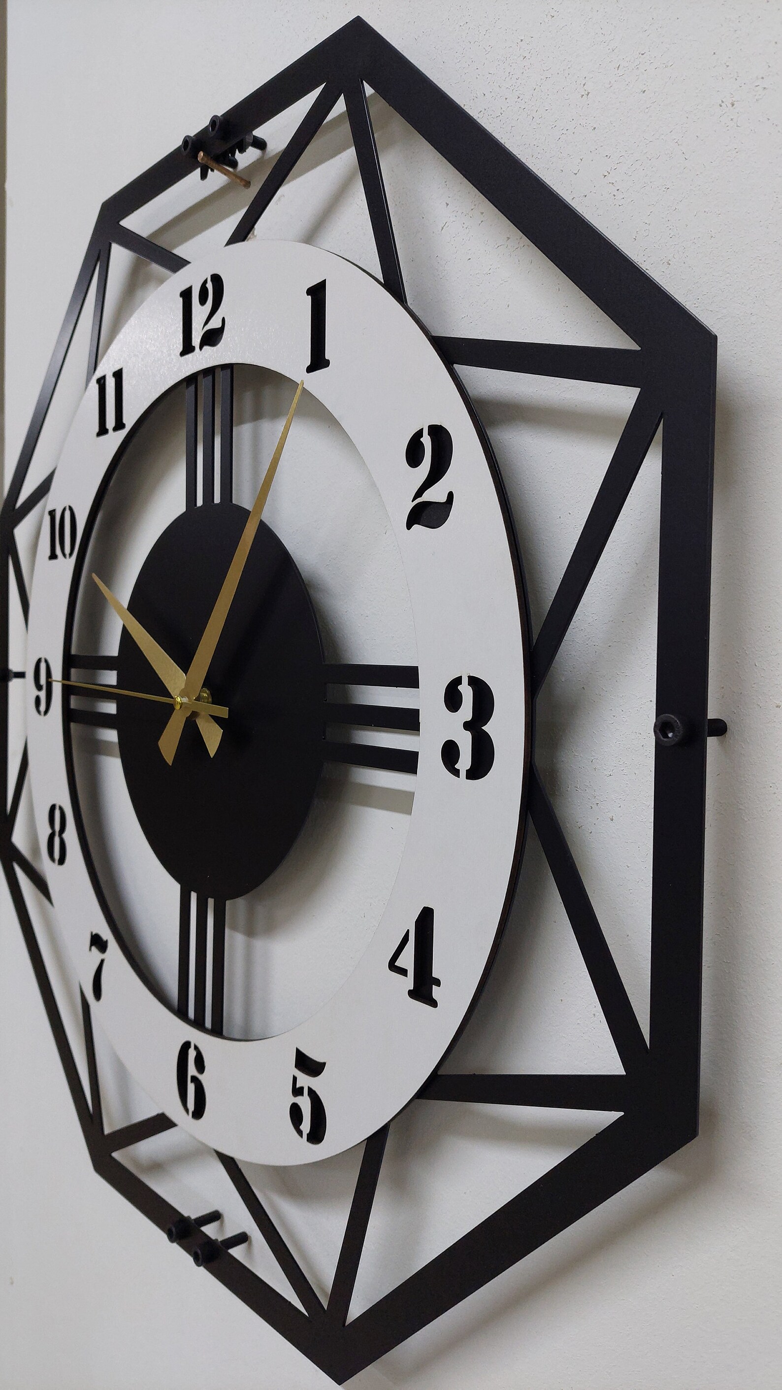 Reloj de pared octagonal de metal hecho a mano: moderno y silencioso ...