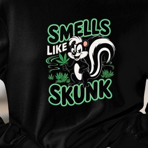 Camiseta, sudadera y sudadera con capucha con el divertido "Huele a zorrillo"