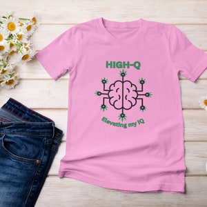May include: Pink t-shirt with a green brain graphic and the text "HIGH-Q Elevating my IQ".