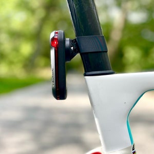 Garmin Varia 300/500 series aero seatpost mounts. Factor Ostro