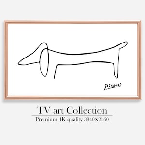 Pode incluir: Impressão emoldurada com um desenho minimalista a preto de um cão dachshund sobre um fundo branco. A obra de arte é assinada "Picasso" e faz parte da "TV art Collection". A moldura é de cor castanho claro.