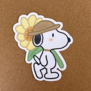 Sunflower Snoopy Vinyl Sticker – Handdrawn Laminated Peanuts Character Decal, Cute Aesthetic Sticker for Journal, Laptop, Water Bottle