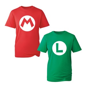 May include: Two t-shirts, one red and one green, with white logos. The red shirt has a white 'M' in a circle, and the green shirt has a white 'L' in a circle.