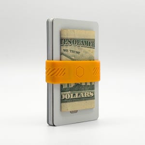 BAND[it] Banda delgada minimalista para billetera (naranja amanecer): banda elástica con clip para dinero en efectivo y tarjetas de crédito; porta billetes de silicona