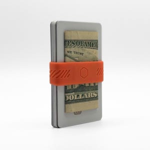 BAND[it] Banda delgada minimalista para billetera (rosa coral/naranja): banda elástica con clip para dinero en efectivo y tarjetas de crédito; porta billetes de silicona.